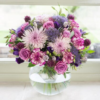 Purple Flower Bouquet with vibrant lilies and lavender, perfect for any special occasion.