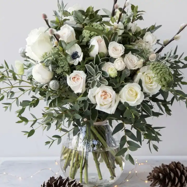 White Rose & Peony Artisan Bouquet 1 Hand-tied white rose and peony bouquet accented with delicate eucalyptus leaves and white ribbon.