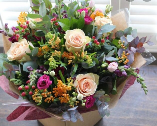 Mixed Floral Bouquet with Roses 1 Buy hand tied bouquet of flower wrapped tissue paper delivery UK