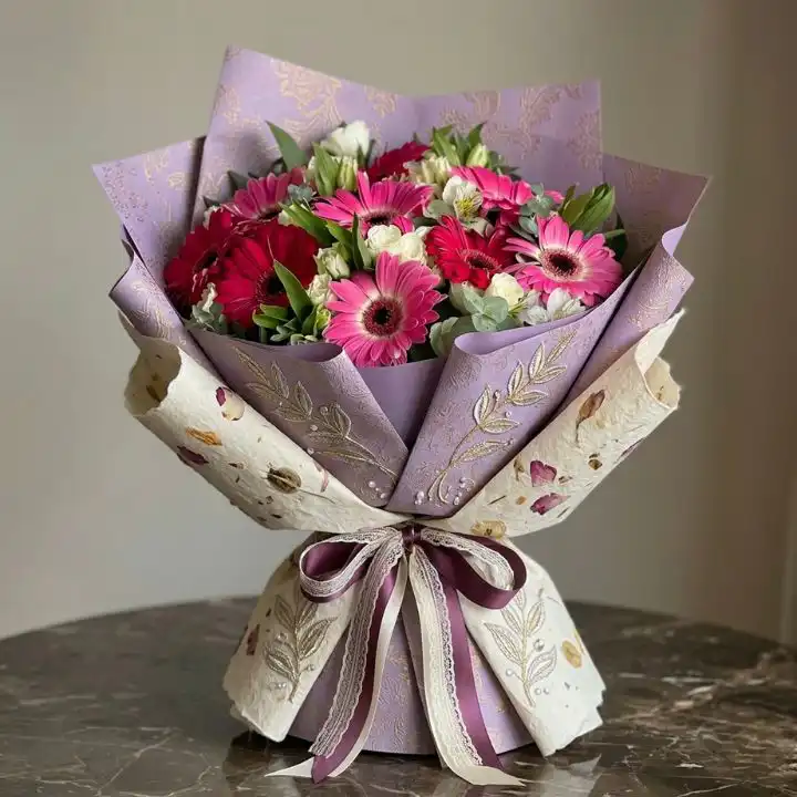 Radiant Pink Gerbera & White Alstroemeria Bouquet 1 A vibrant pink gerberas bouquet mixed with elegant white alstroemeria and green foliage.