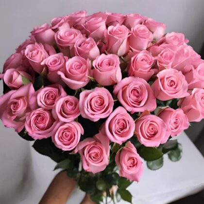 Our 50 Pink Rose Flowers for International Women's Day make a stunning gift to honor the women in your life. Pink roses symbolize admiration, gratitude, and appreciation, making them perfect for this occasion. Each rose is handpicked for its vibrant pink hue and arranged with care to create a beautiful bouquet. The flowers are freshly sourced, ensuring a long-lasting bloom. With next-day delivery available across the UK, you can count on timely arrival and top-quality flowers. We also provide order tracking and delivery confirmation for peace of mind. Show your appreciation with this thoughtful and elegant bouquet.