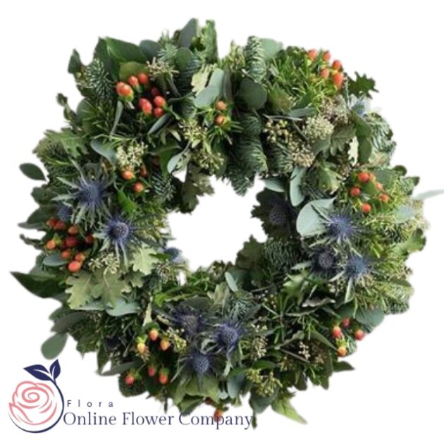 Highland Luxury Christmas door wreaths 1 Highland luxury Christmas door wreath with rich greenery, red berries, pinecones, and festive ribbons for elegant décor