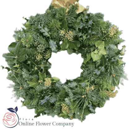 Luxury Christmas festive foliage wreath with mixed greenery, pinecones, and red berries for elegant holiday décor