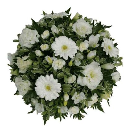 A round bouquet of white flowers including gerbera daisies, carnations, and buds with green leaves.