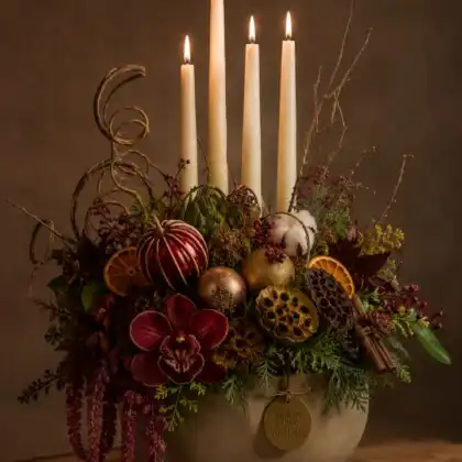 Flower arrangements with candles for christmas