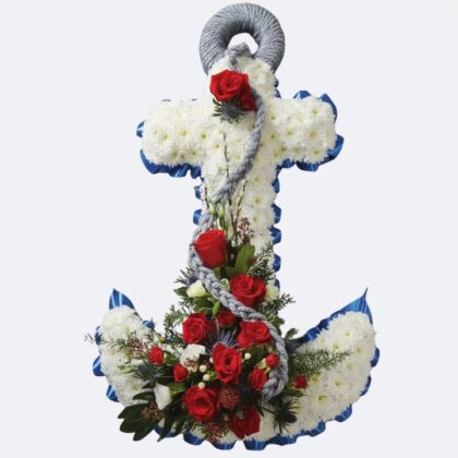 A nautical Anchor Funeral Tribute handcrafted with fresh red roses and white chrysanthemums.
