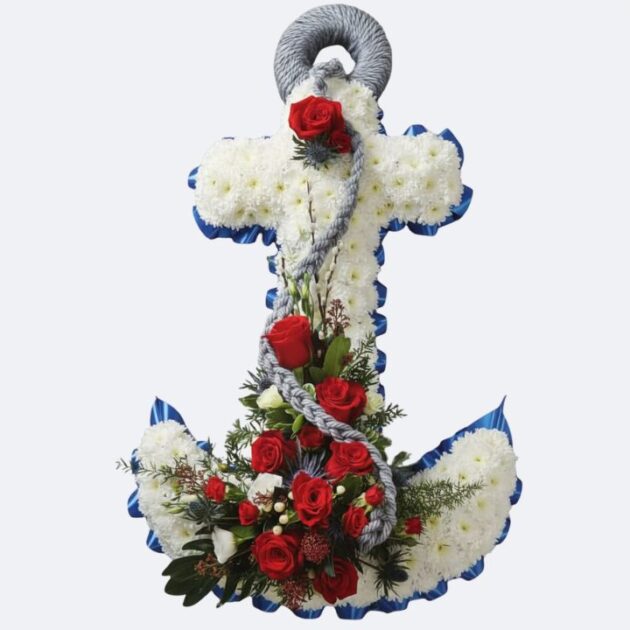 A nautical Anchor Funeral Tribute handcrafted with fresh red roses and white chrysanthemums.
